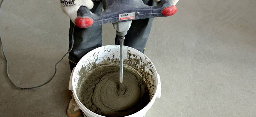 Выставление маяков для стяжки пола