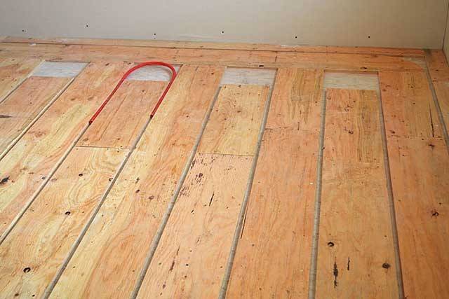 Теплый пол под ламинат на деревянный пол (электрический, водяной)