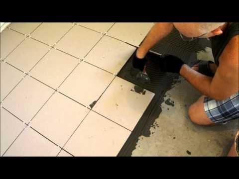 Как положить кафель на пол своими руками (видео)