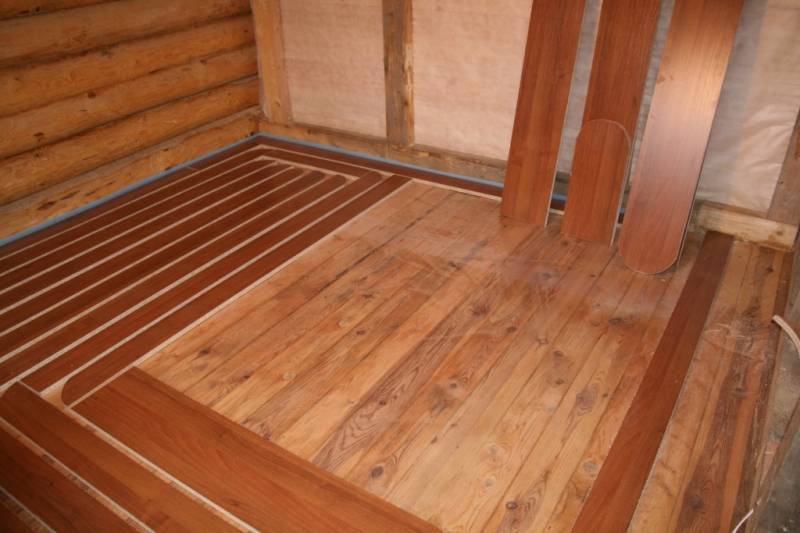 Водяной теплый пол на деревянный пол: по деревянным лагам и реечный варианты